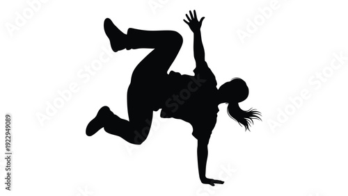 A black silhouette of a person dynamically breakdancing with an outstretched arm