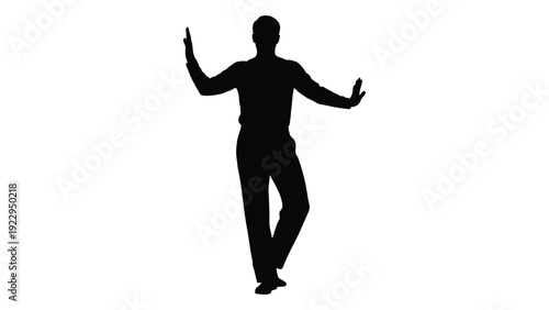 Silhouette of a person with arms outstretched appearing to dance or pose