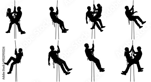 Silhouettes of people rappelling down ropes in various poses.
