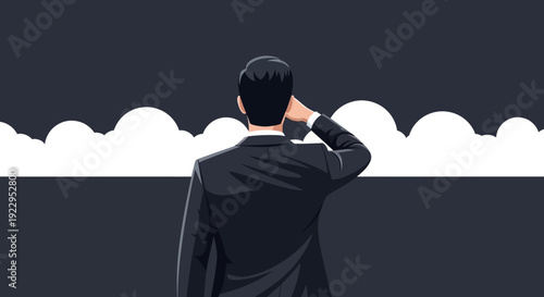 Man in suit looking thoughtfully towards bright clouds on dark background
