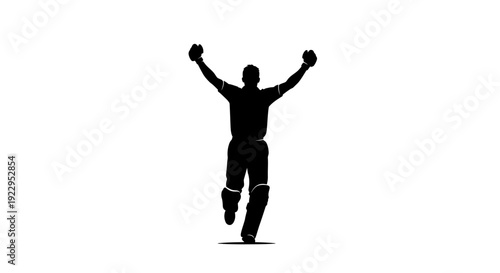 Man celebrating with arms raised in triumphant gesture