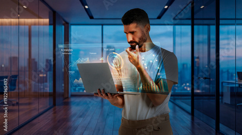 Business analyst reviewing AI analytics dashboard on laptop