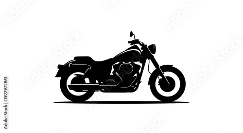 Classic black motorcycle with detailed engine and wheels, symbolizing freedom and the open road, isolated white background.
