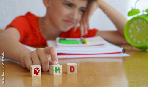 Tableau sur toile child with MD frustrated doing homework, importance of educational needs and special attention to this disorder