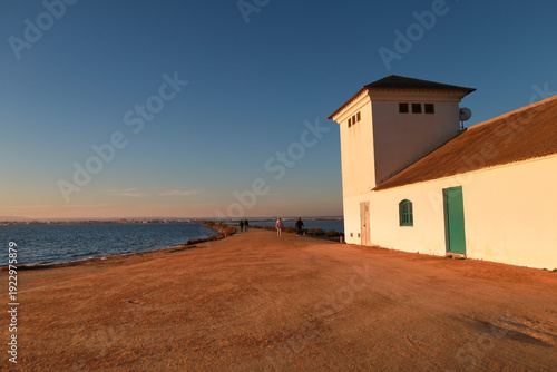 Εκτύπωση καμβά The Calcetera Mill between salt ponds in San Pedro del Pinatar town
