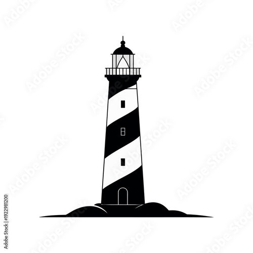 Tall black and white striped lighthouse stands sentinel upon rocky coastal land.