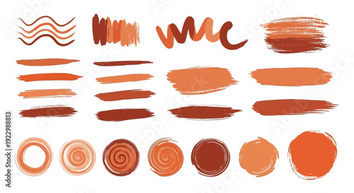 Collection of abstract orange brush strokes and circular shapes in various shades and sizes on a clean background