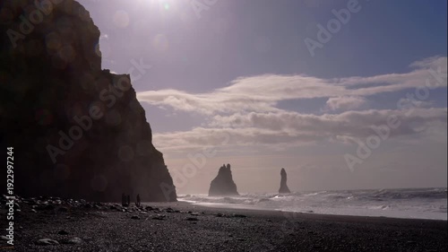 Basalt columns and waves at Reynisfjara Beach in Iceland
