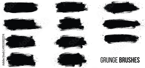 A collection of grunge black brush strokes on a white background