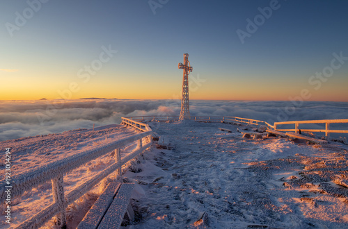 Cross on the summit of Tarnica in winter, Bieszczady National Park.
