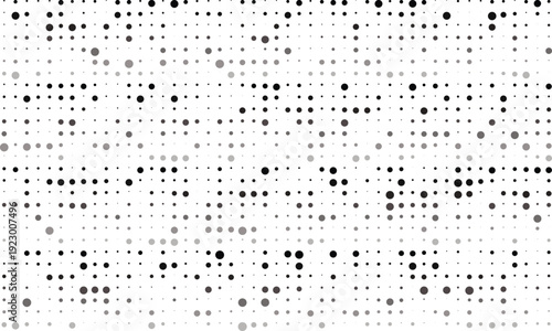 Halftone dots pattern in shades of gray on for design and texture