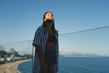 Woman Enjoying Rooftop View of Copacabana