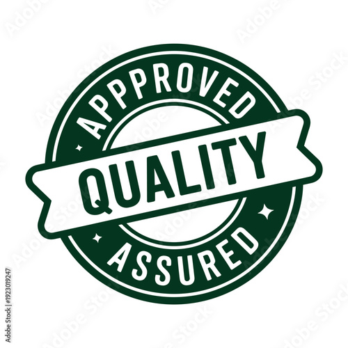 A green and white quality assured stamp on a plain background