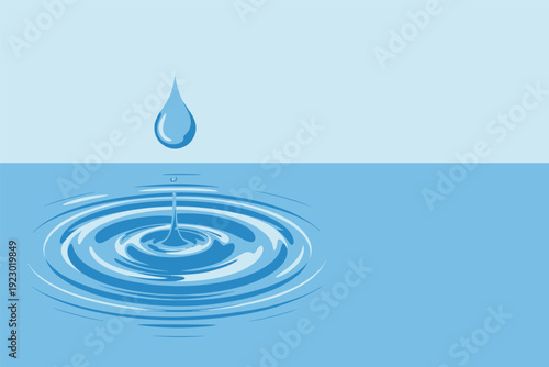 Water droplet creating ripples in calm blue water surface