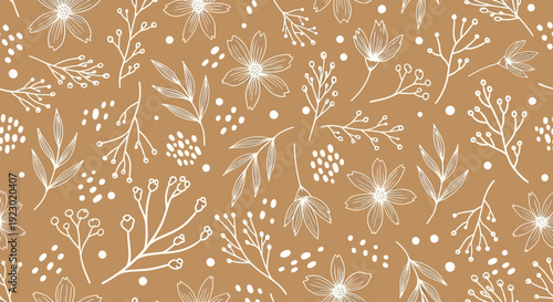 An overhead view of a seamless floral pattern featuring flowers, leaves, and branches on a warm-toned background, showcasing illustrations