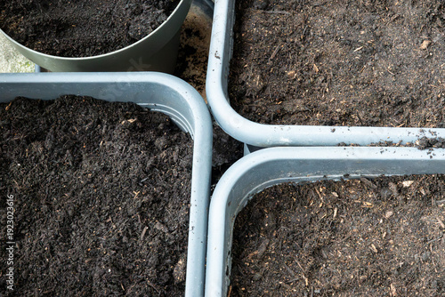 Canvas-taulu Planter boxes with soil prepared for planting on balcony.