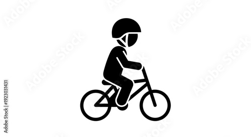 A person rides a bicycle wearing a helmet byo outdoors