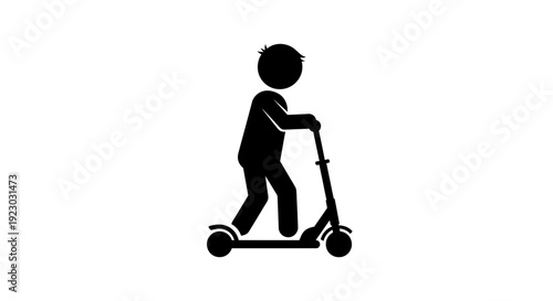 A boy rides a scooter outdoors byo