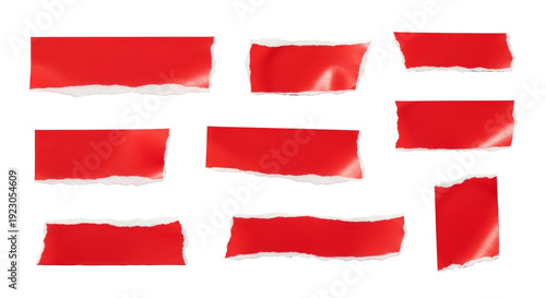 Set of red adhesive torn tape pieces on a white background, showcasing ripped edges for design or mockup purposes.