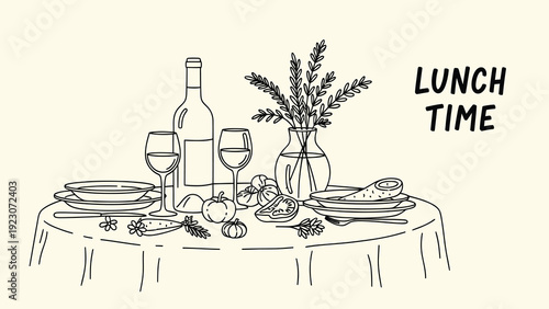 A beautifully set table with wine and a vase of flowers for a lovely lunch time