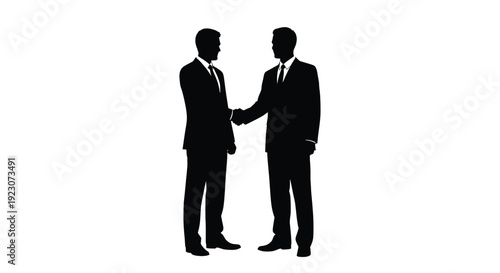 
Two businessmen shaking hands in a professional setting