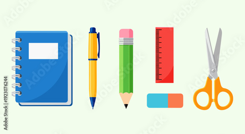 Colorful school supplies arranged on a light green background for education