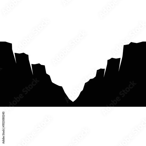 Silhouette of a deep canyon with sharp edges.