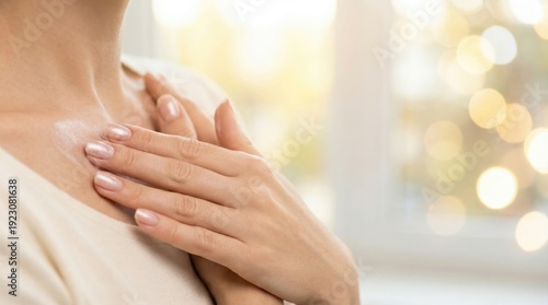 Wallpaper Mural Woman with beautiful nails gently applying moisturizing cream to her neck and chest for skin care. Torontodigital.ca