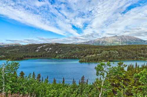 Beautiful cloudscape over the Emerald Lake. Yukon Territories, Canada