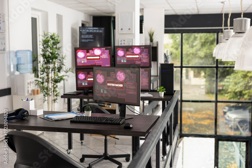 Fotografi Desktop monitors show system error warnings in empty office workspace