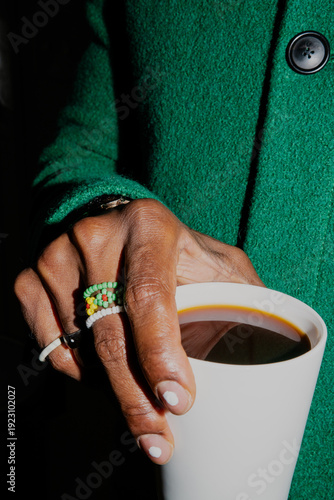 Close Up Stylish Young Man Holds Cup of Black Coffee