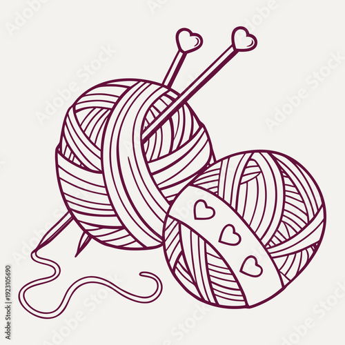 Two intertwined balls of yarn with knitting needles featuring decorative hearts for cozy crafting projects
