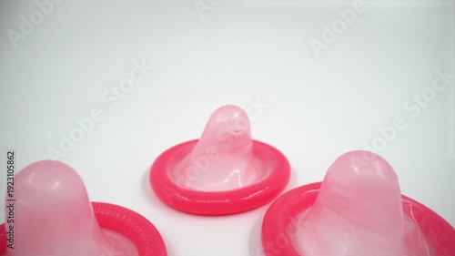 Unused condoms on white background isolated