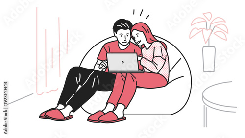 パソコンを操作しているカップル