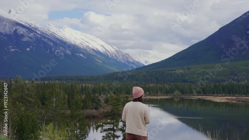 Wallpaper Mural Woman standing by Vermilion Lakes looking at Mount Rundle reflecting in water in Banff National Park Torontodigital.ca
