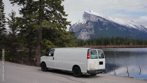 Wallpaper Mural White camper van parked beside Vermillion Lakes with mountains and forest in Banff National Park Torontodigital.ca