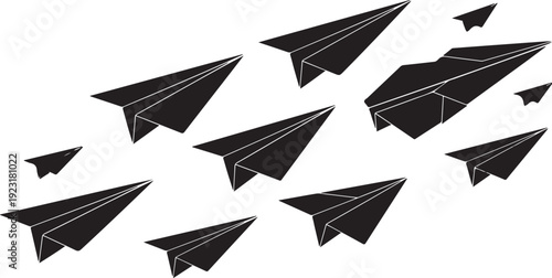 Black paper airplanes flying in different directions freely