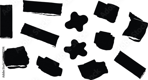 described features several irregular black shapes scattered across