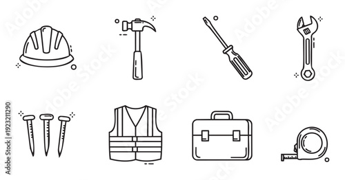 Collection of essential construction tools and safety equipment like a hard hat, hammer, and measuring tape for engineering projects, home improvement, and building industry work.
