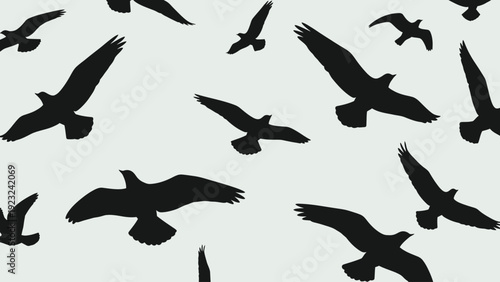 Silhouettes of various birds in flight creating a dynamic and free-spirited pattern.