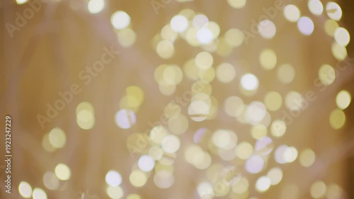 Soft defocused golden lights creating a warm bokeh background