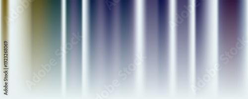 Colorful vertical lines blend softly, creating an abstract background.