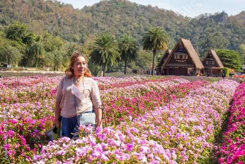Woman Posing in a Field of Flowers