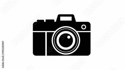 Black and white camera icon graphic.