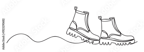 Stylized contour drawing depicting two trendy boots in a fluid continuous stroke, suitable for contemporary apparel branding, footwear advertisements, or print media.