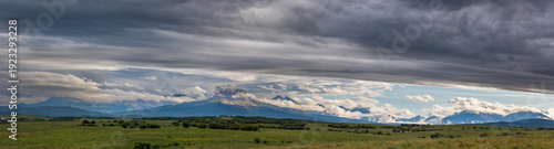 Dramatic Mountain Landscape With Storm Clouds, Rolling Hills and Moody Light Over Plateau Peak