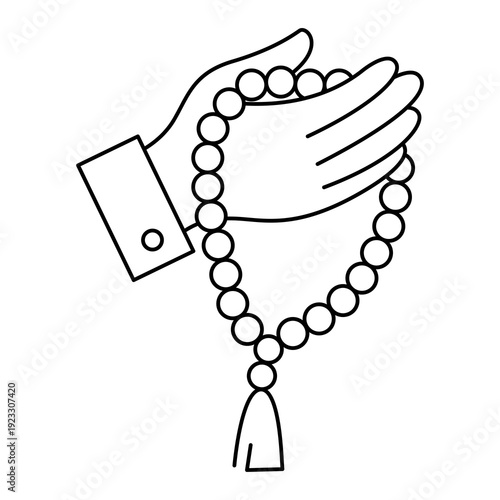 Hand holding a string of prayer beads, a symbol of meditation and faith