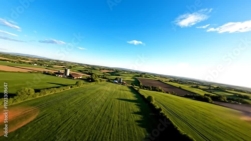 Aerial view of rural fields and hedgerows at golden hour