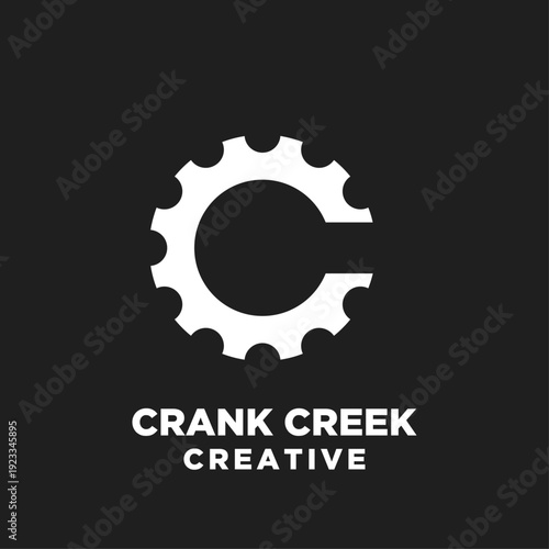 Crank Creek Creative Logo with White Gear C Shape on Black Background