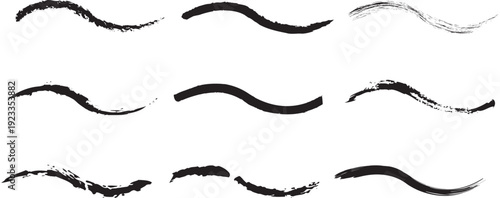 Set of black ink wavy brush strokes and curved grunge paint lines on white background